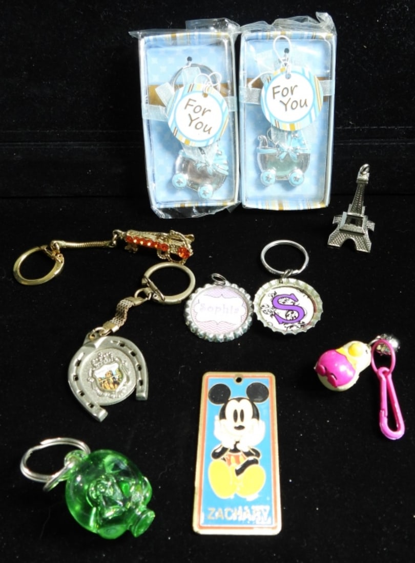 10 Mixed Lot Of Key Chains: 2 For you baby boy key chains, Mickey Mouse key chain, a green pig, a pinguin, and more