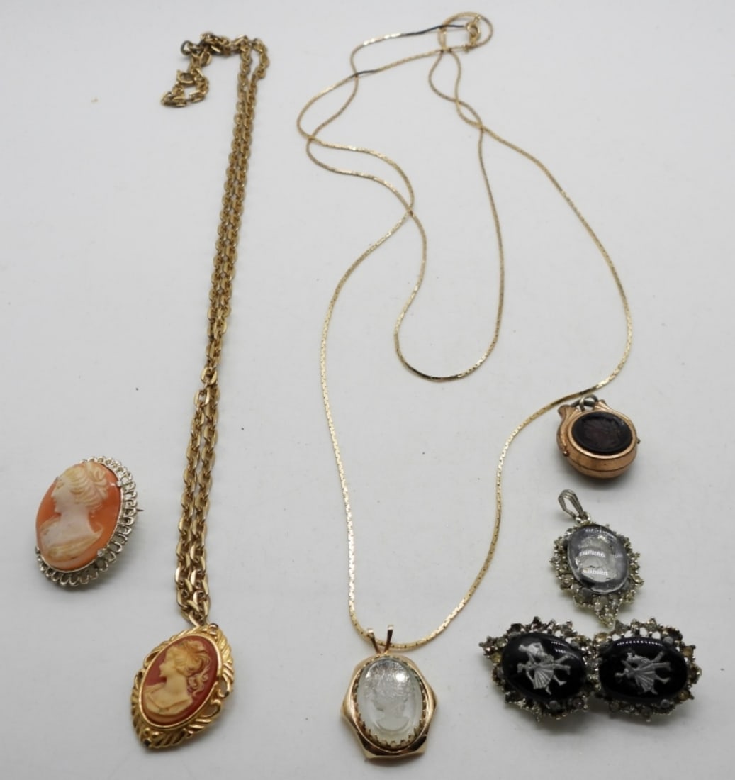 Mixed Cameo Lot: This lot has 4 pendants, 2 chains, 1 brooch, and 1 pair of clip-on earrings