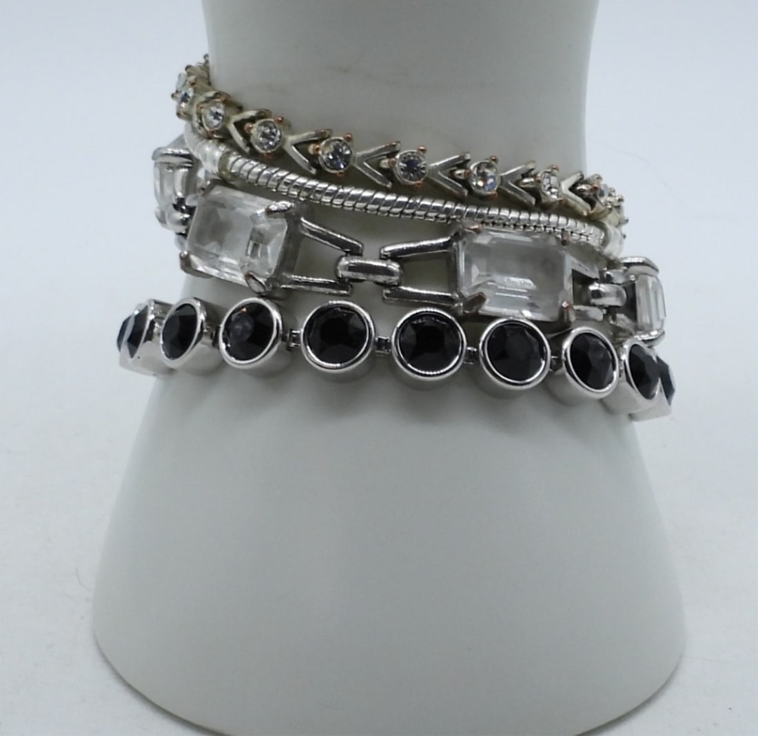 4 Silver Tone Bracelets, a variety of styles (1 of 3)