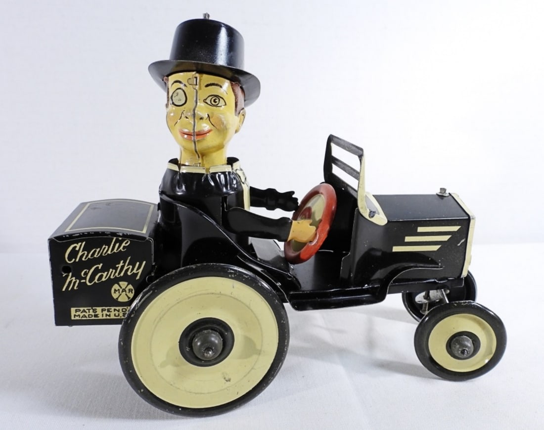 Marx Charlie McCarty Benzine Buggy Car: Tin toy made by Marx from the 1930s, does wind up and move as it should.