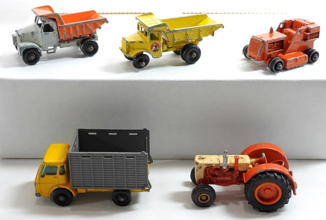 (5) Variety Of Tractor And Trucks: (5) Variety of tractors and trucks- Matchbox cattle truck, 4 unknown brands of tractors. Dump truck- Drott Excavator. In fair to good condition, does show some wear, preowned.