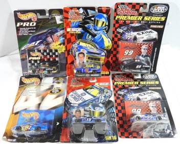 (6) 4 Racing Champions and 2 Hot Wheels