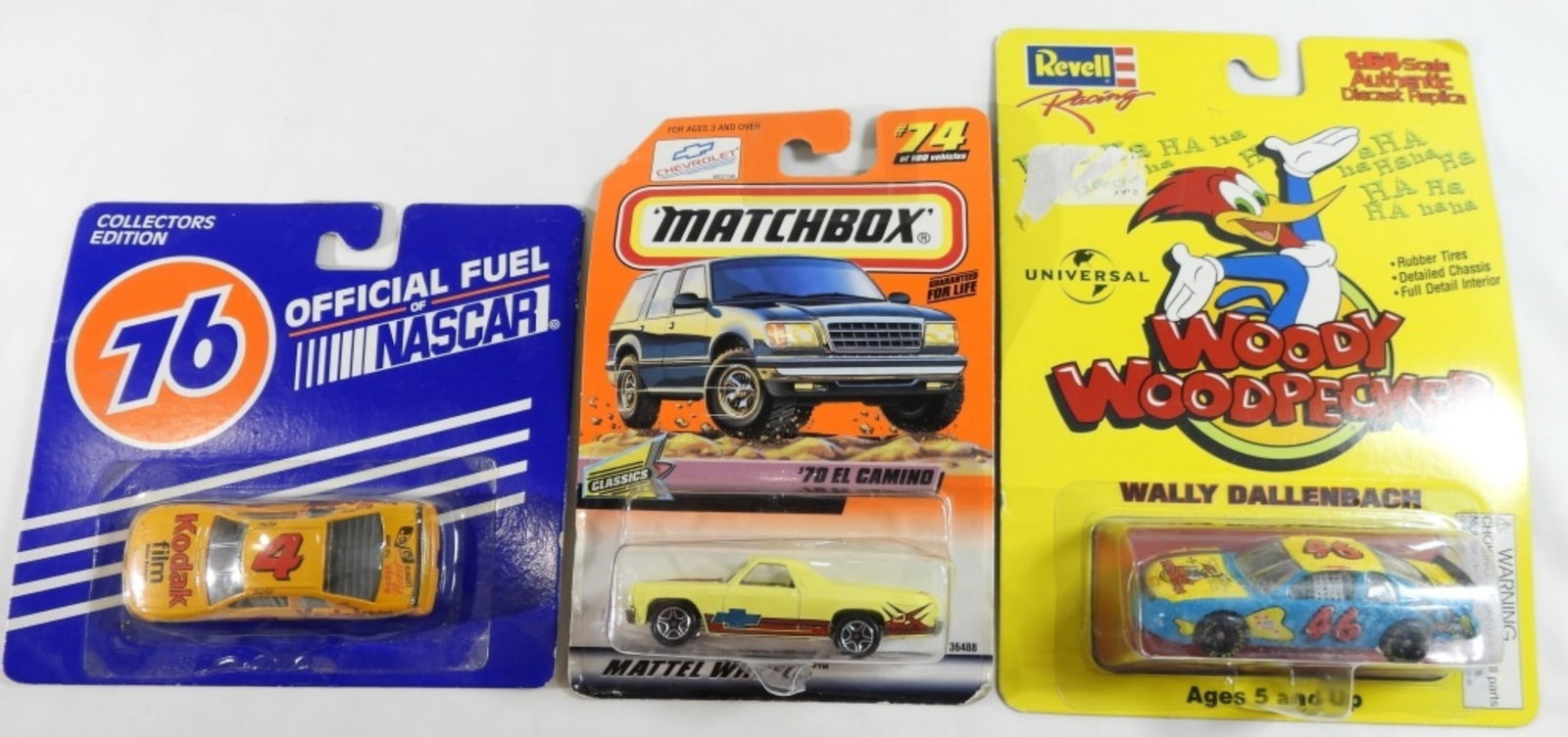 (3) Die Cast 1:64 Scale Cars: Like New in original packages. Matchbox ' 70 El Camino. Revell Racing #46/ and number 4 Kodak 76 Official Fuel of Nascar.