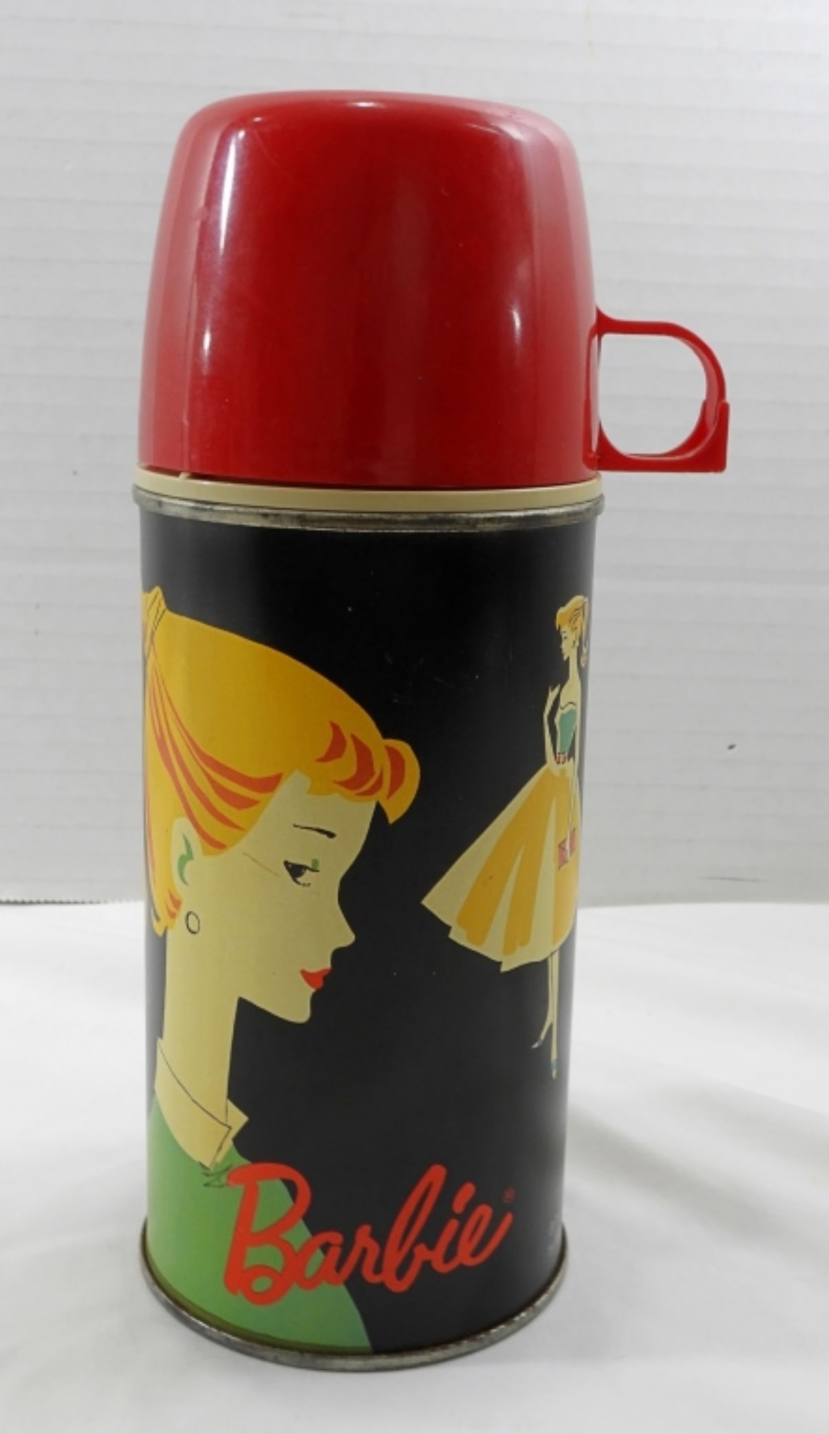 1962 Retro Ponytail Barbie Thermos: 1962- Ponytail Barbie Thermos by Holtemp 10 oz red cup, does show some wear from the years. In fair to good to condition, preowned.