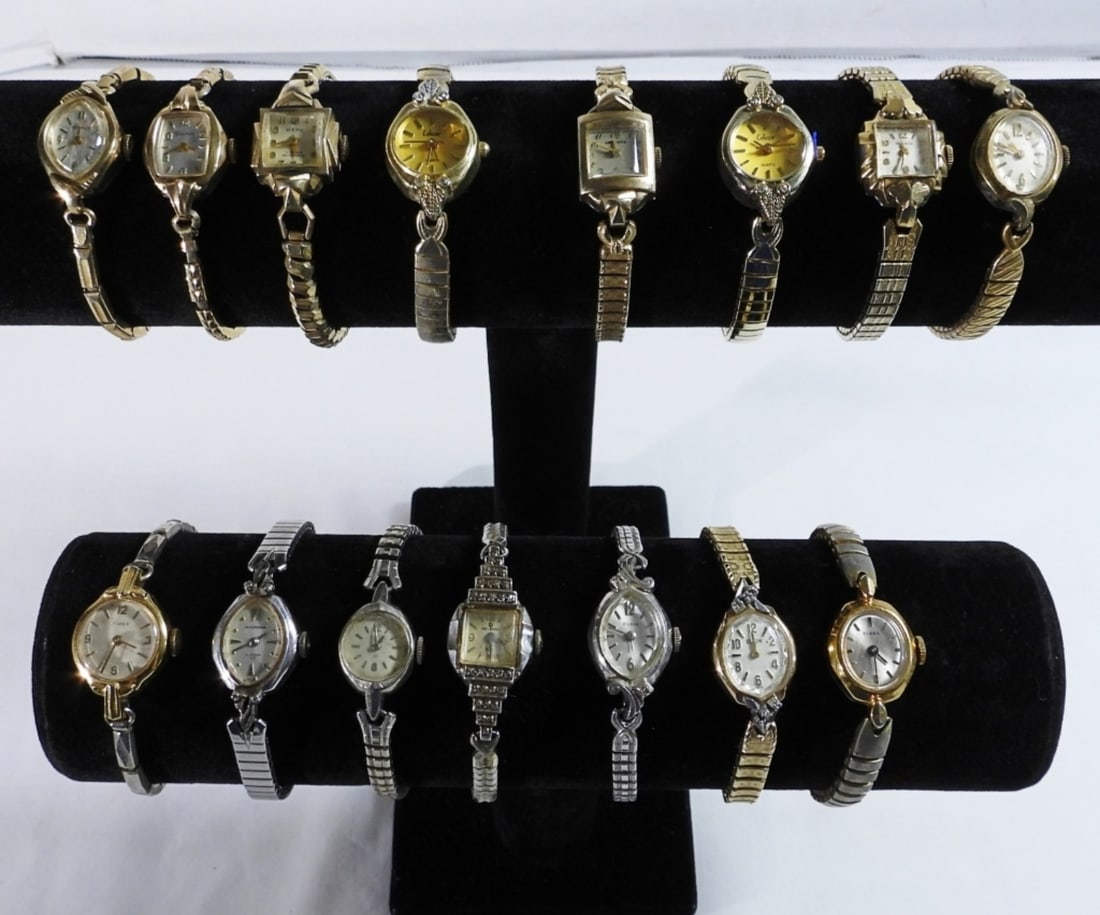 15 Vintage Women's Stretch Band Watches: Watches are not verified, authenticated, or tested in running condition unless specified, mixed gold and silver tones, good condition, mixed brands