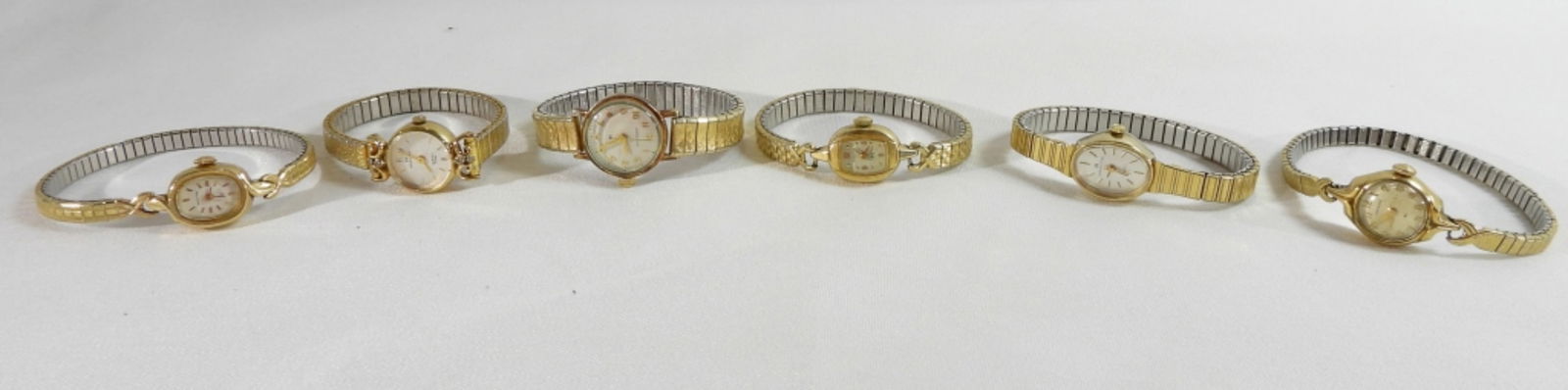 6 Stretchy Hamilton Women's Watches: Watches are not verified, authenticated, or tested in running condition unless specified. 6 stretchy Hamilton women's watches. They are all unique in their own way