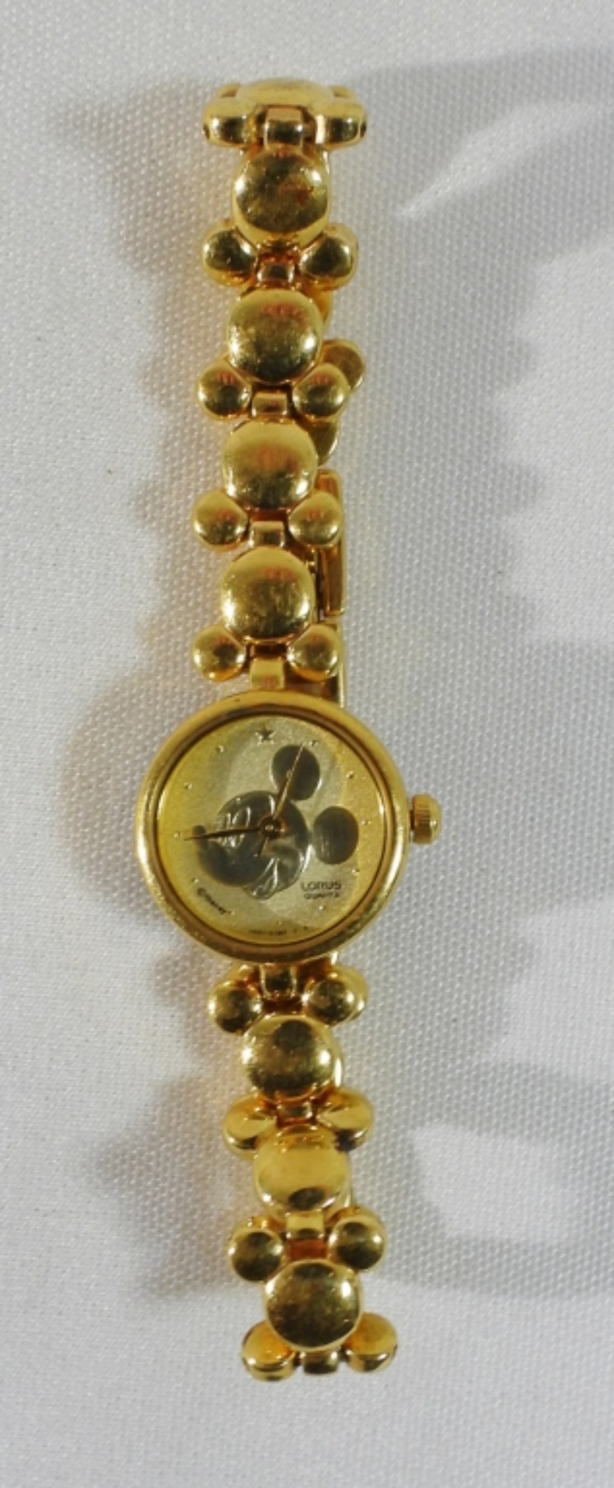 Disney Mickey Mouse Watch Lorus: not verified, authenticated, or tested in running condition unless specified. Disney Mickey Mouse Watch Lorus gold-toned.