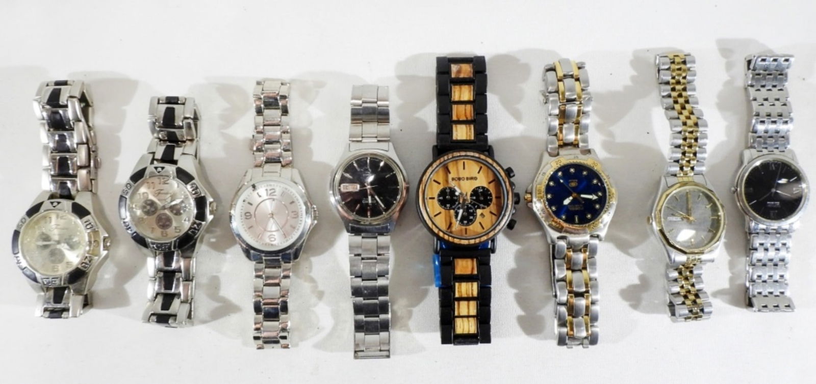 8 Men's Fashion Watches: Different styles and conditions, Bobo Bird, Fondini, Seiko, to name a few, in this lot. Watches are not verified, authenticated, or tested in running condition unless specified.