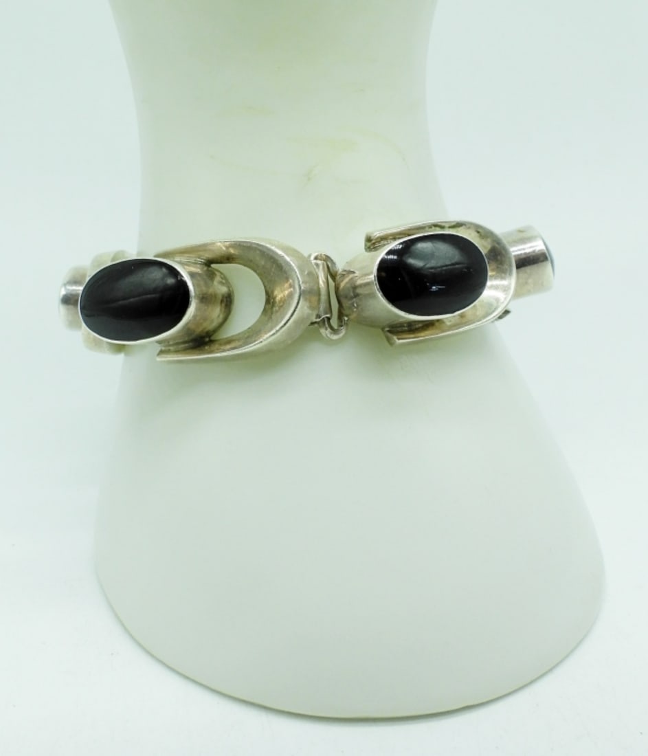 Taxco Sterling Black Onyx Bracelet: Taxco Sterling Black Onyx Bracelet with Safety Chain. Marked "TS-1?? Mexico 925" Cannot read it all. 7". (40.2 dwt)