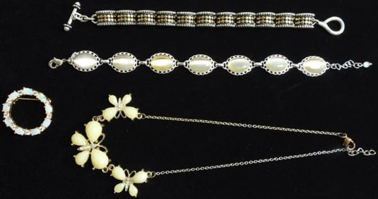 (2) Bracelets (1) Brooch (1) Necklace