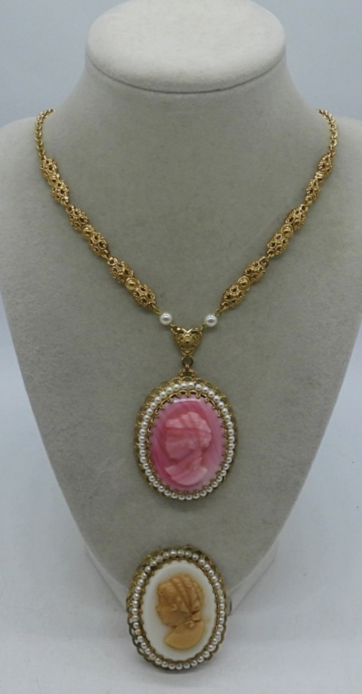 Vintage West Germany Cameos: cameo pin with gold tones and beads around measuring 2" in length, 26" gold tone chain with cameo also 2" long, with pink, made in West Germany
