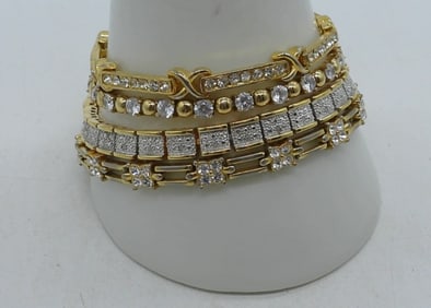 4 Gold Tone Bracelets