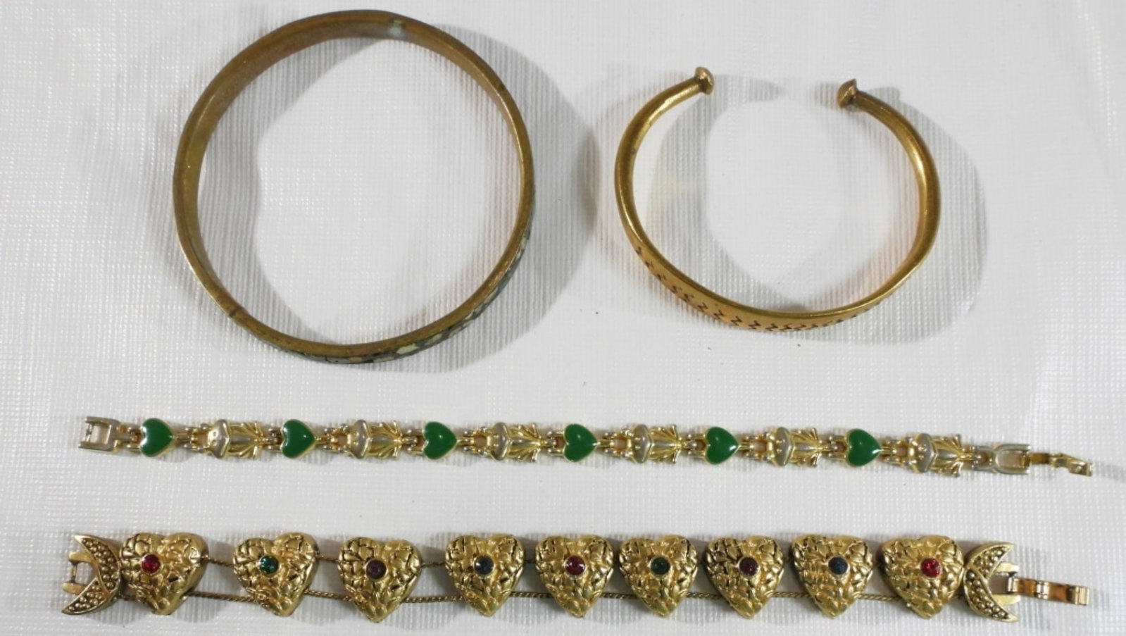 (4) Bracelets: (4) Bronze-toned Bracelets