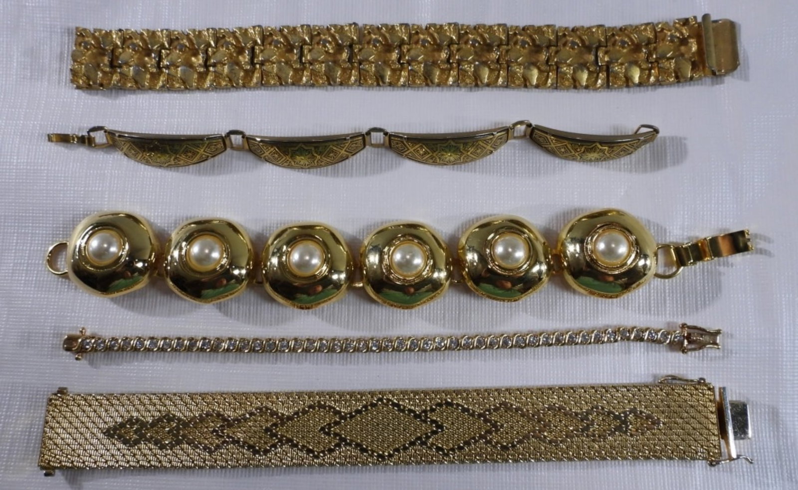 (5) Bracelets: Gold tone