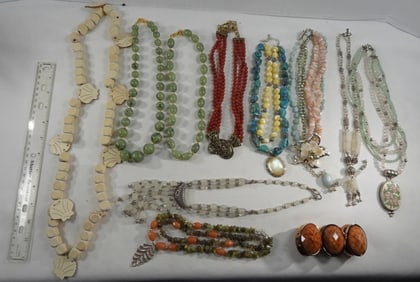 9 Chucky Necklaces, 1 Bracelet