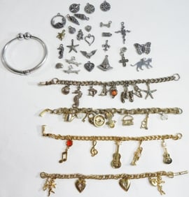 (5) Charms Bracelets and Small Bag Of Charms