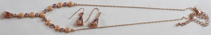 (1) Necklace (1) Pair Of Dangle Earrings