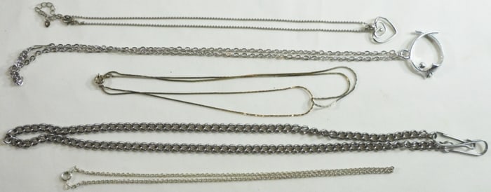 5 Silver-tone Necklaces.
