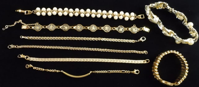 8 Gold-tone Bracelets
