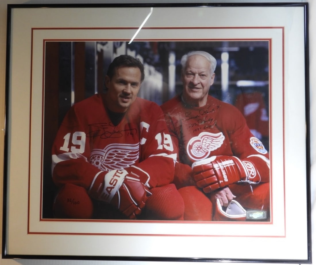 Large Photo of Red Wings: This photo is of Steve Yzerman and Gordie Howe. Both signed. Comes with an unverified COA by Hockey Town