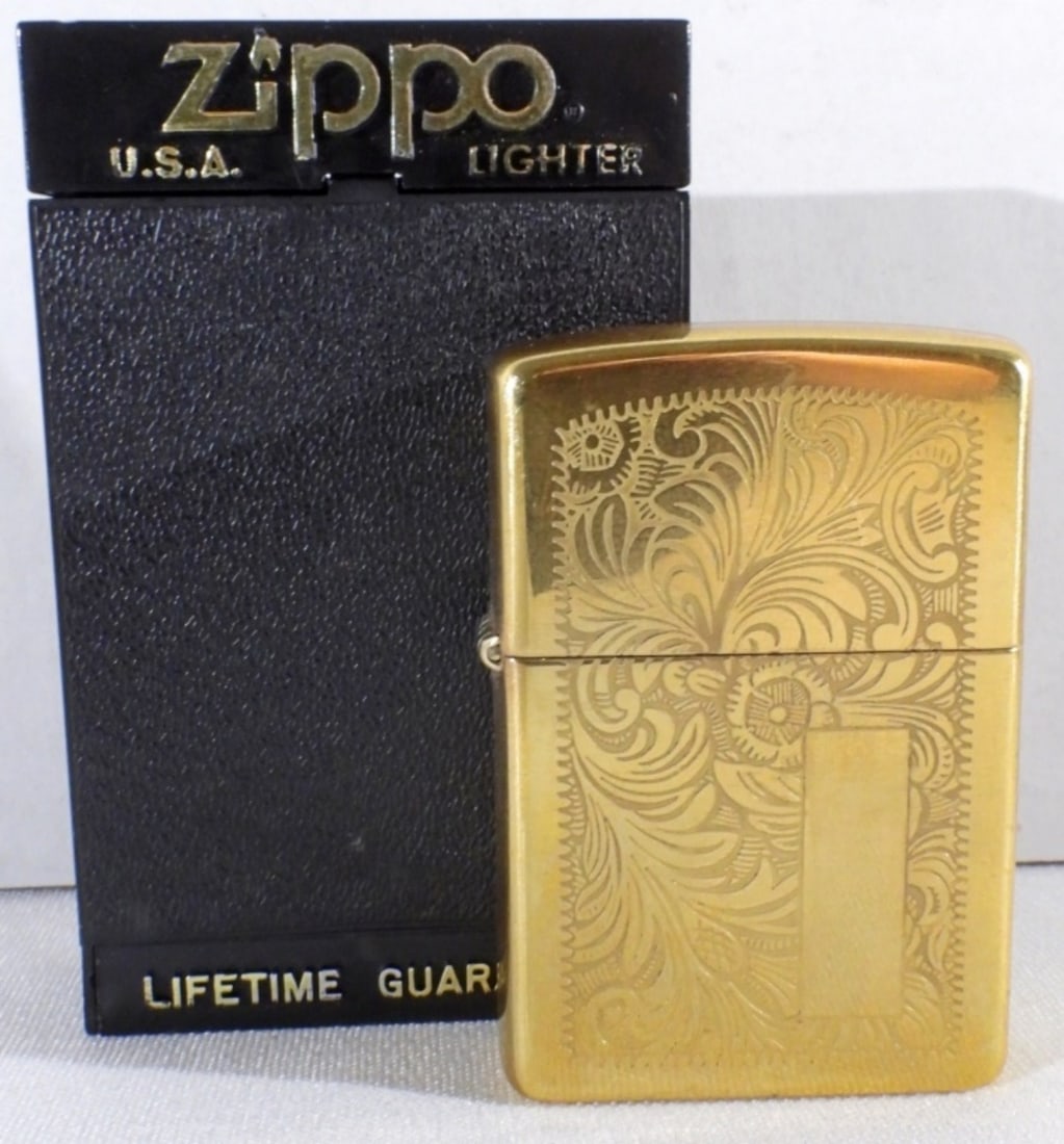 Unfired 1998 High Polish Venetian Design Zippo: Comes in a box, unfired, 1998. Does have a spot open to engrave