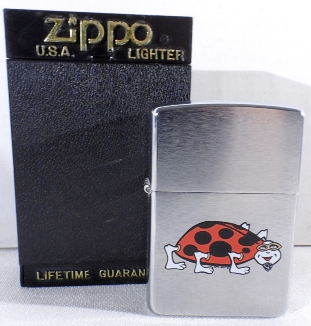 Sealed 1996 Lady Bug With A Goatee Zippo: Comes in a box, sealed 1996