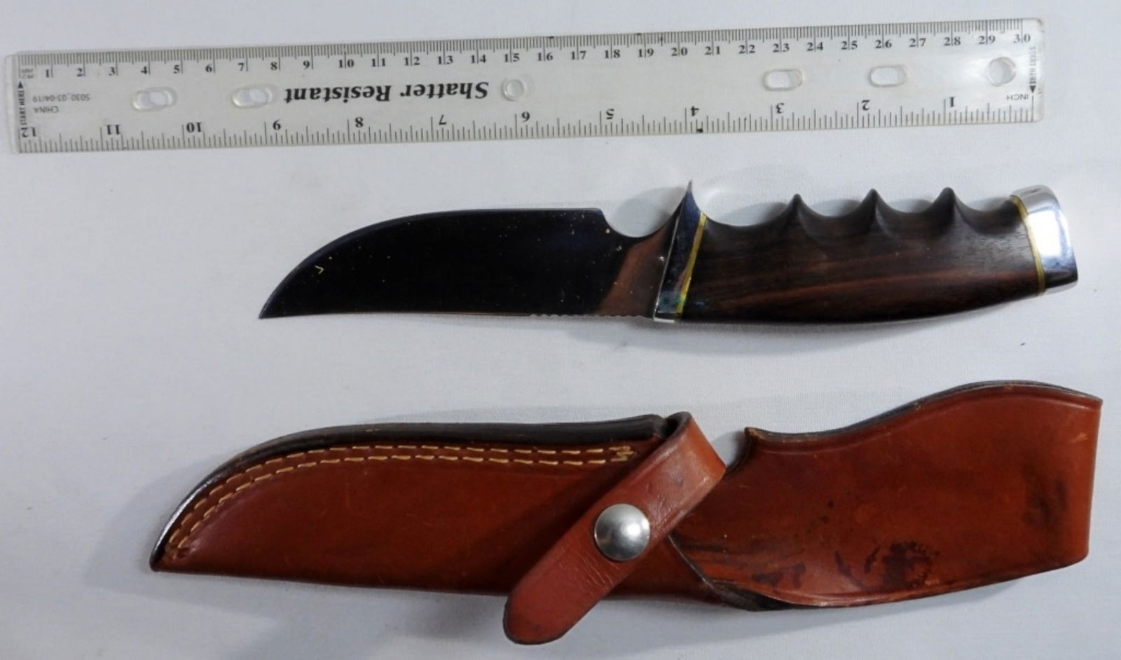 Gerber Model 475: With a brown leather sheath