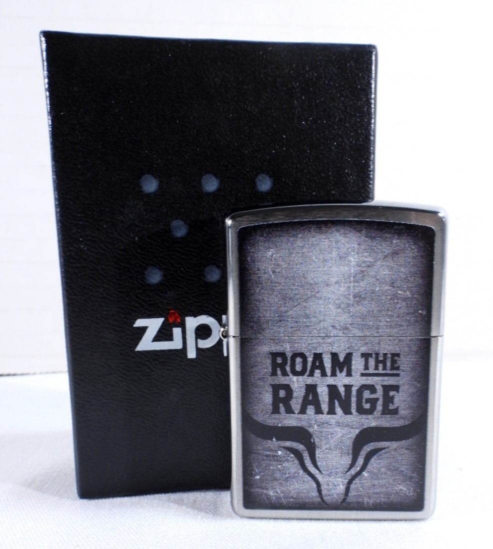 2022 Sealed Zippo Roam The Range Marlboro: In a box, sealed, " Roam The Range" on the front.