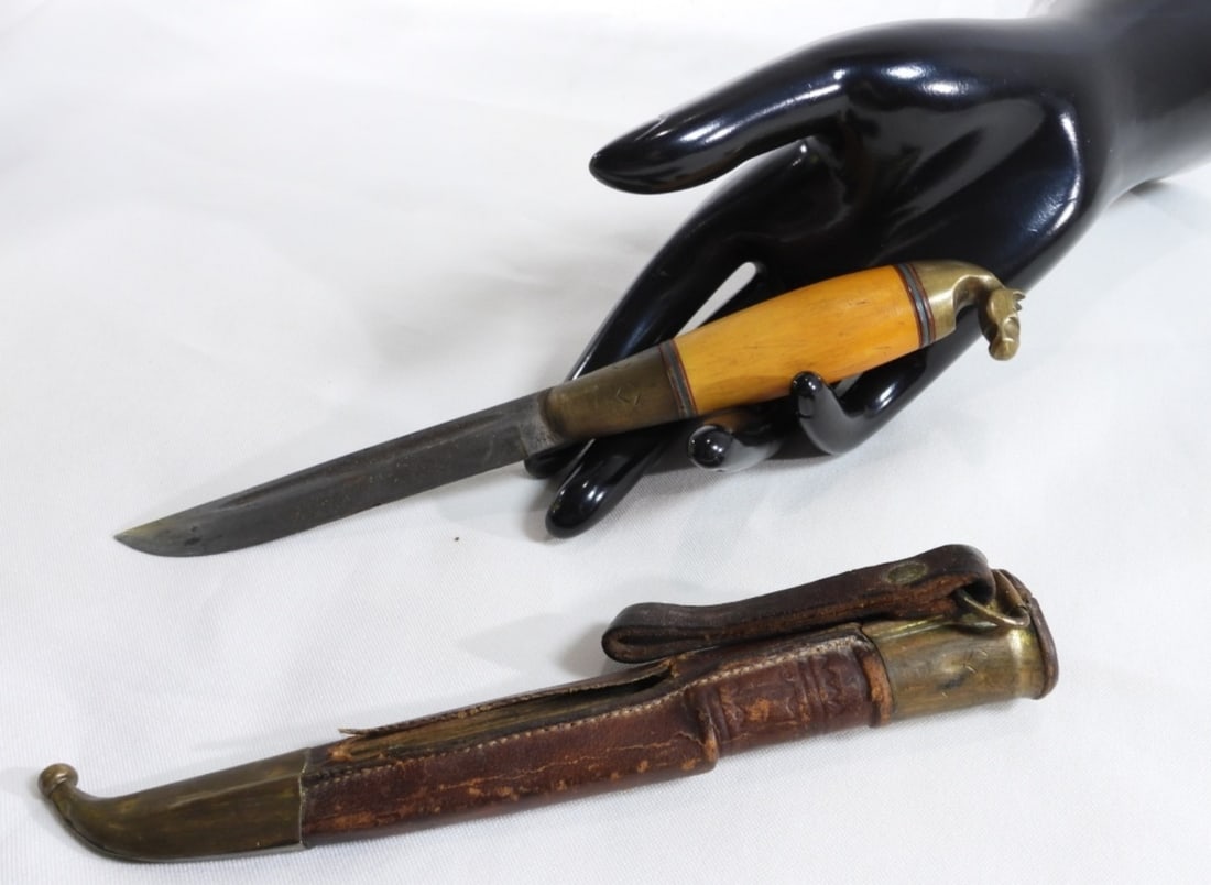 Finland Brass Horse Head Puukko Knife: This beautiful knife has a brass horse head. Comes with a leather sheath.