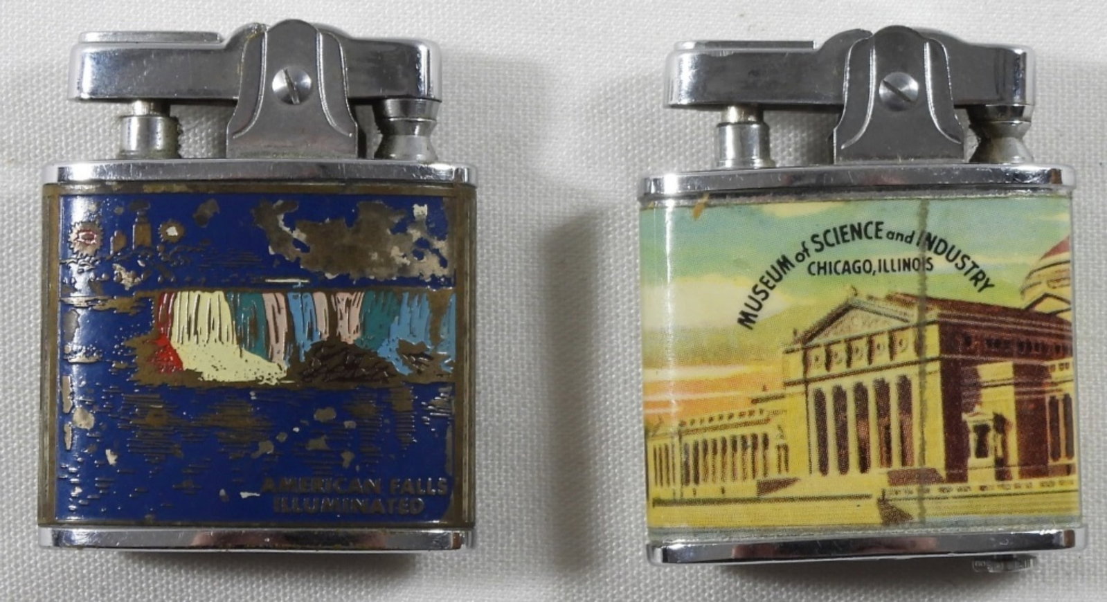2 Fired Tourist Omega Lighters: 2 Fired Tourist Omega Lighters, its very difficult to push one of the buttons on a lighter. Untested as to working.