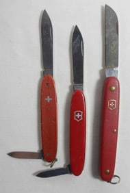 3 Red Victorinox Pocket Knives