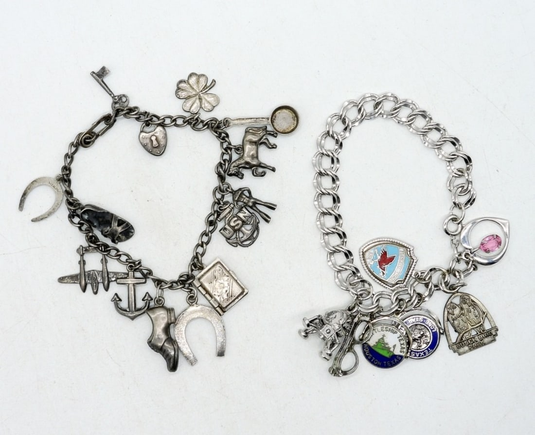 2 Vintage 925 Charm Bracelets: Two sterling vintage charm bracelets. Both 7". (29.5 dwt)