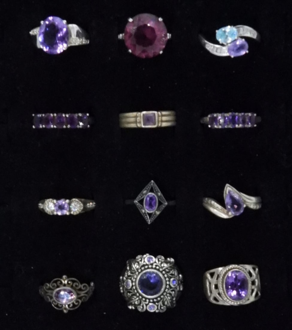 12 Amethyst Sterling Fashion Rings: 12 Sterling Rings. Mostly amethyst gemstones. Sizes 6.5-10 (29 dwt)