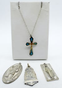 Four Sterling Religious Pendants