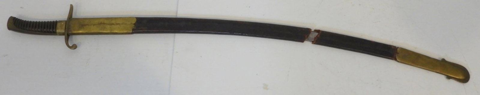 Cavalry Saber With Scabbard: unmarked saber 33" blade, scabbard is in three pieces, late 19th, early 20th century