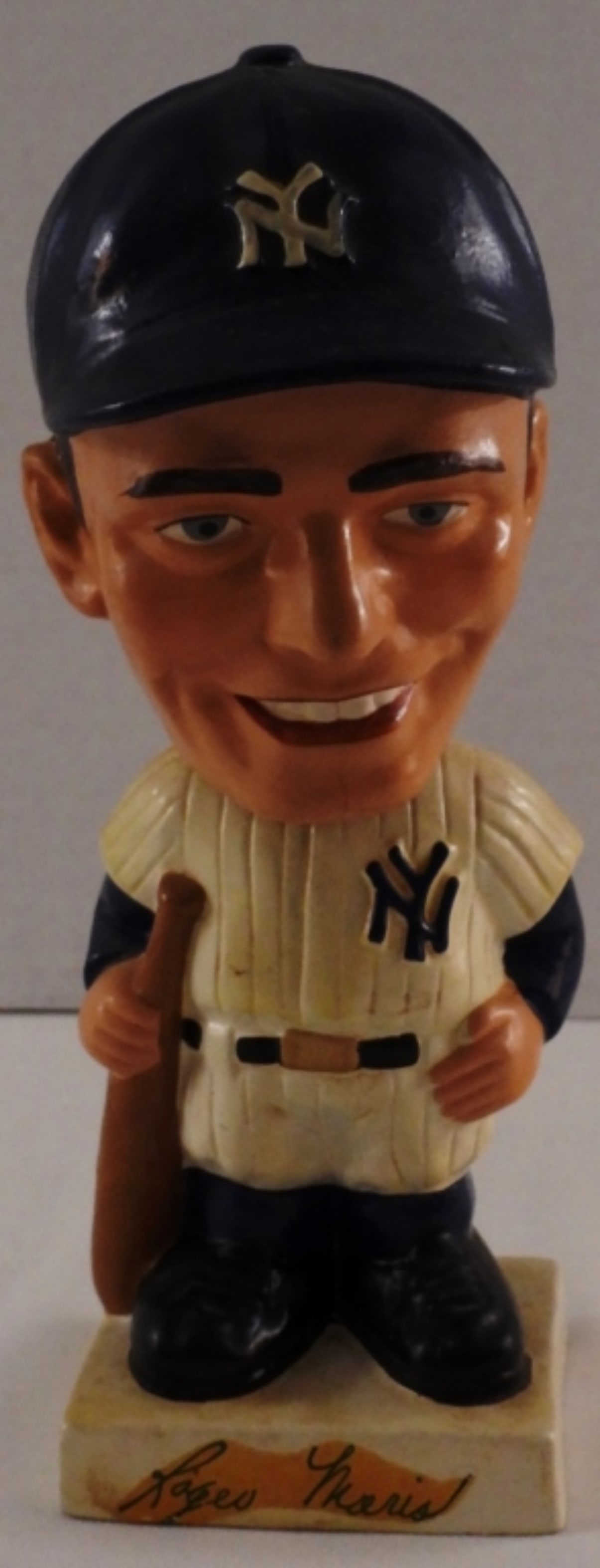 Roger Maris Bobblehead 1960s: 1960s Roger Maris bobblehead, made in Japan, the head is not attached to the spring, the head has cracks on all sides of the face, some going from the base of the head to the hat line, and cracks in t