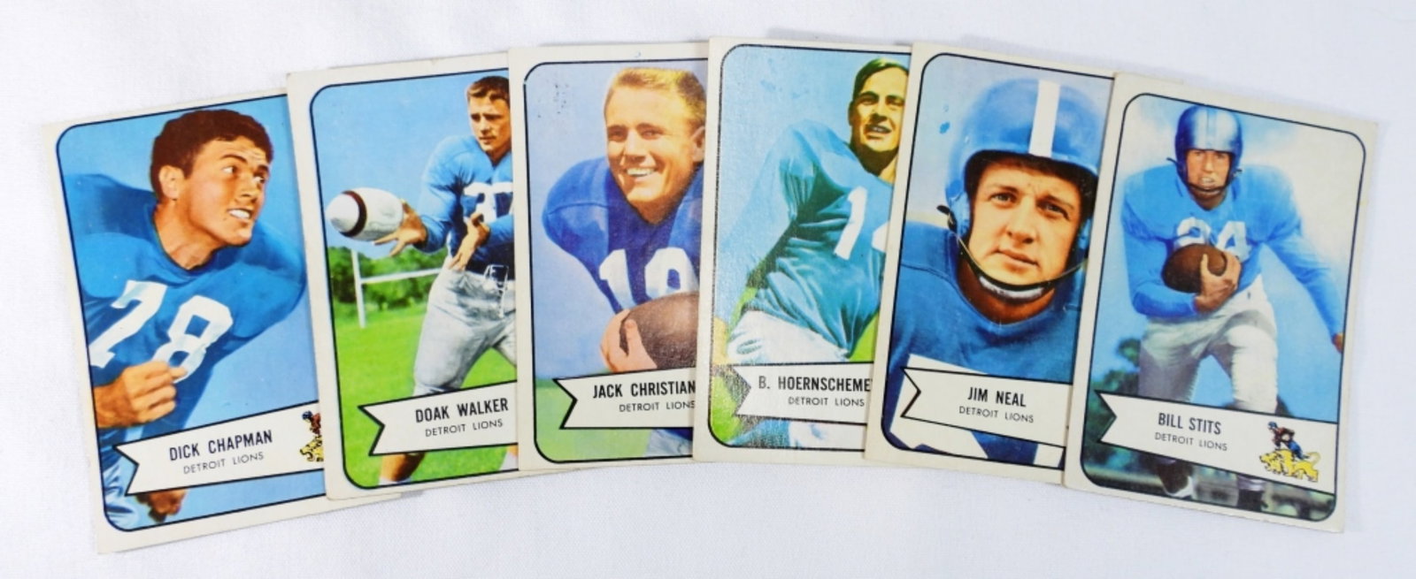Mixed Lot Of 6 Detroit Lions Cards: Jack Christiansen #100 card, Doak Walker #41 card, Dick Chapman #65 card, and more.