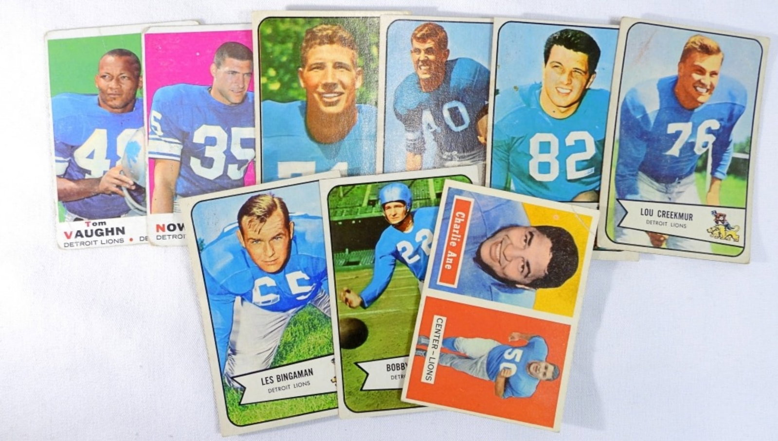 Mixed Lot Of 9 Detroit Lions Cards: Leon Hart #121 card, Lou Creekmur #85 card, Les Bingaman #29 card, and more.