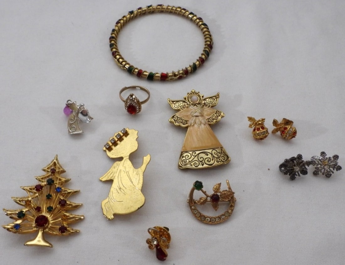 Christmas Jewelry Lot: 2 pairs of earrings, gold-tone bangle, 6 pins, and gold-tone ring with red faux gem