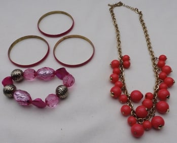 (4) Pink bracelets And A Necklace