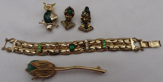 (4) Gold-Toned Brooches And A Bracelet