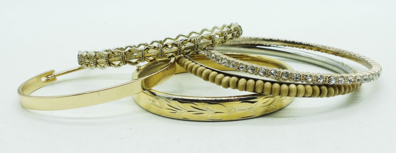 5 Gold-toned Bangles: different sizes, 1 with faux diamonds