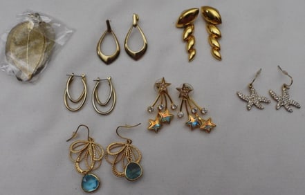 7 Pairs Of Gold-Tone Dangle Earrings