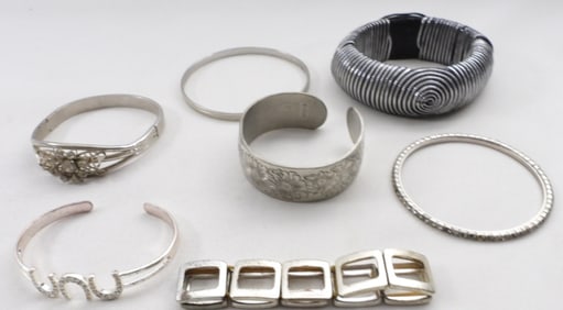 (7) Silver-Toned Bracelets