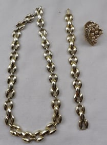(1) Bracelet. (1) Necklace (1) Pair Of Clip-Ons