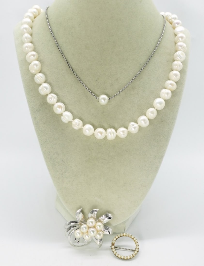 Pearl Necklaces & Brooches with Sterling: Two pearl necklaces with sterling chain & clasp, 18" & 24". Two brooches with pearls, 1-2". (13.4 dwt)