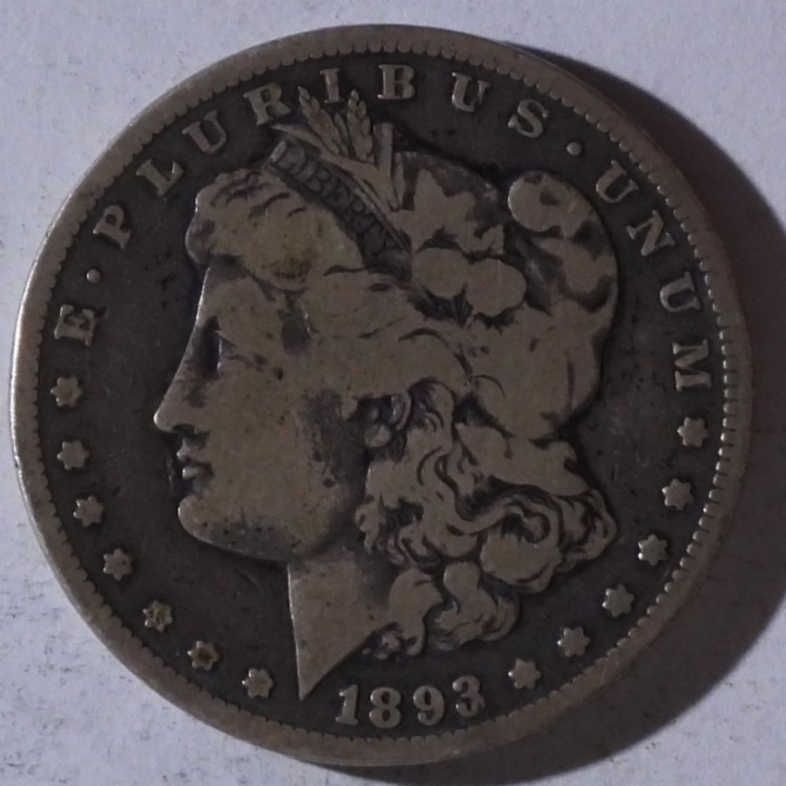 1893-CC Morgan Dollar: bid live now!