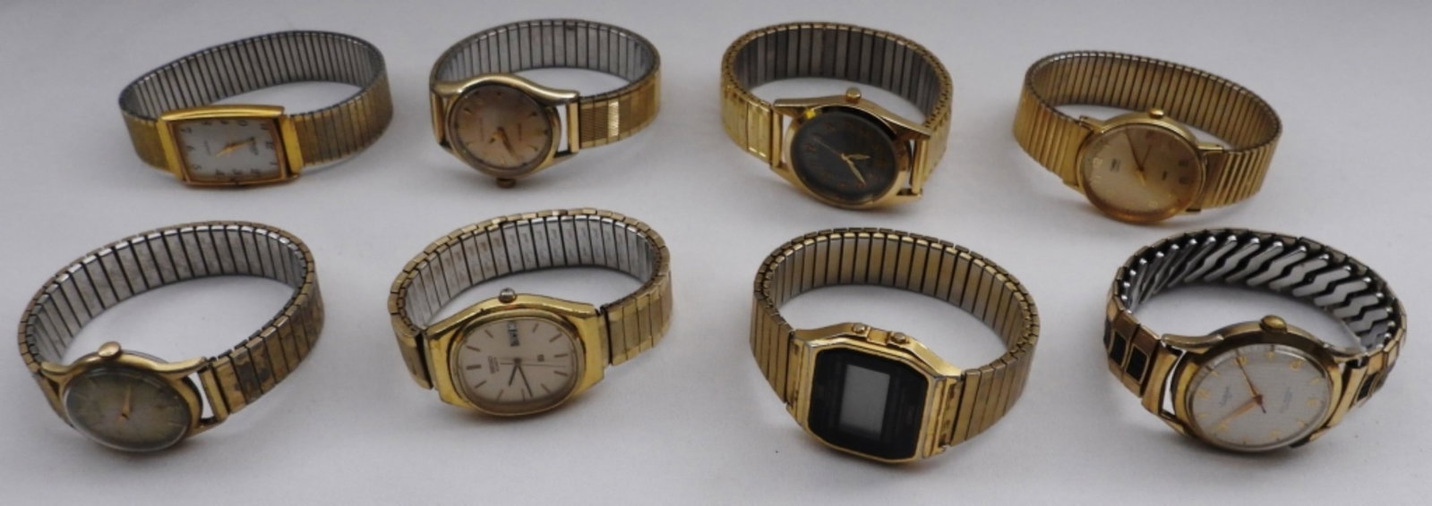 8 Men's Stretch Band Gold-Tone Watches: Watches are not verified, authenticated, or tested in running condition unless specified, 8 gold-tone stretch band, different styles and sizes