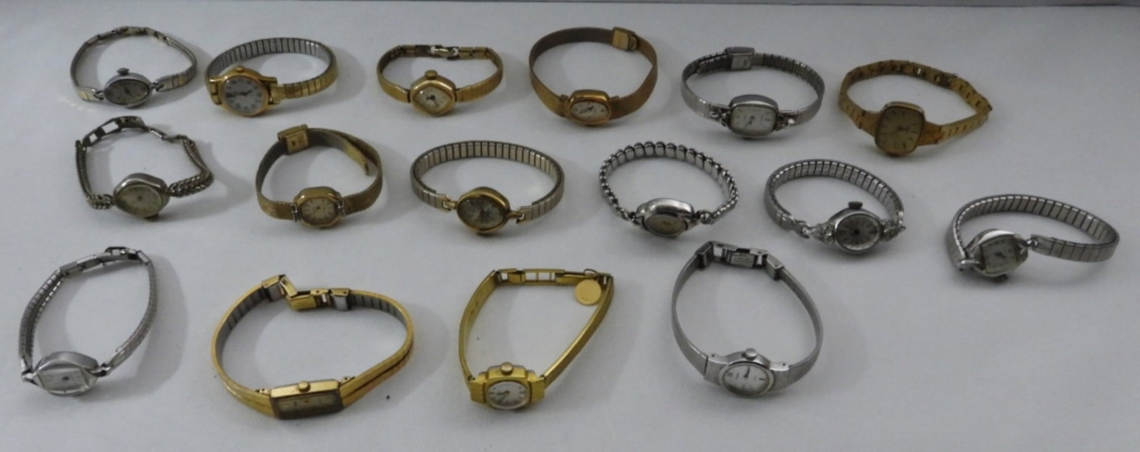 16 Mixed-Tones Ladies Watches: Watches are not verified, authenticated, or tested in running condition unless specified, gold and silver-toned, different sizes and styles