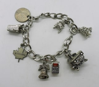 Sterling Vintage Charm Bracelet - 8 Charms